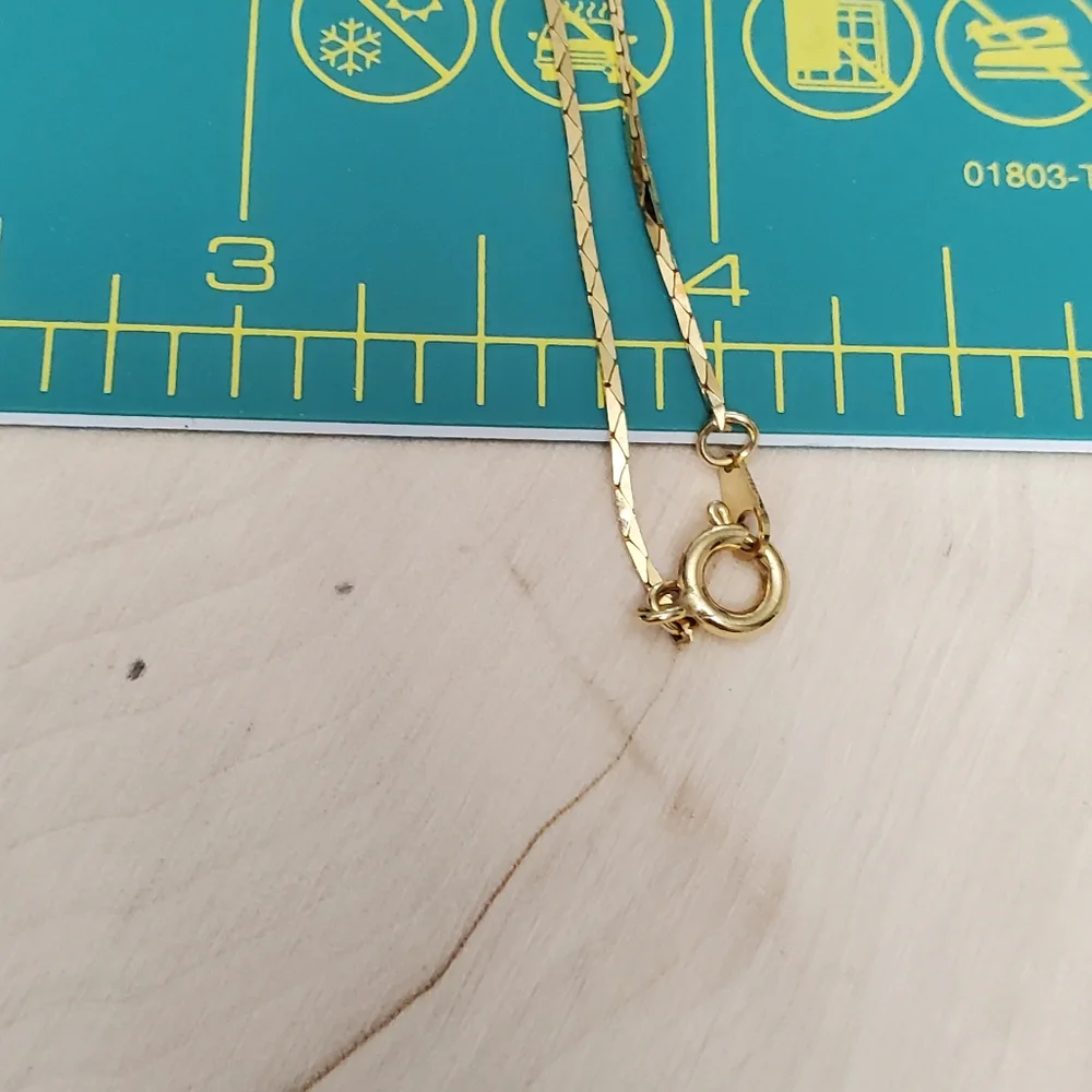 Gold Bead Illusion Horn Necklace